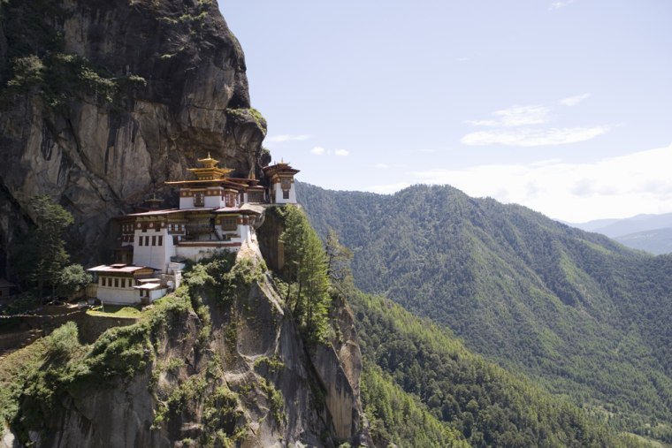 The Kingdom of Bhutan is the last remaining kingdom in Asia and is the only place in the world to measure Gross National Happiness. Takstang means “tiger's lair” and hangs on a cliff high above the Paro valley. Visitors must climb the slope on foot or by mule. 